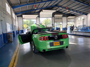 Ford Mustang parked inside test centre at ITV station Ford Mustang at ITV